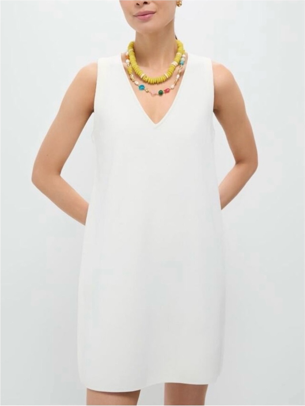 Pomander Place White V-Neck Sleeveless Mini Dress